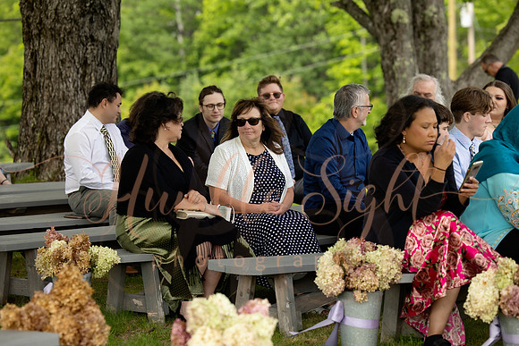 Bride and groom portraits by the water at Grace on the Lake