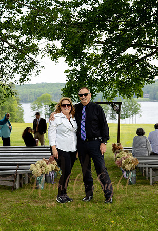 Bride and groom portraits by the water at Grace on the Lake