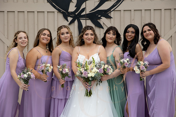 Bride and groom portraits by the water at Grace on the Lake